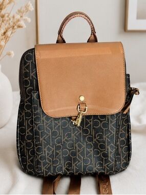 Calvin Klein Monogram Backpack with Tan Leather Flap